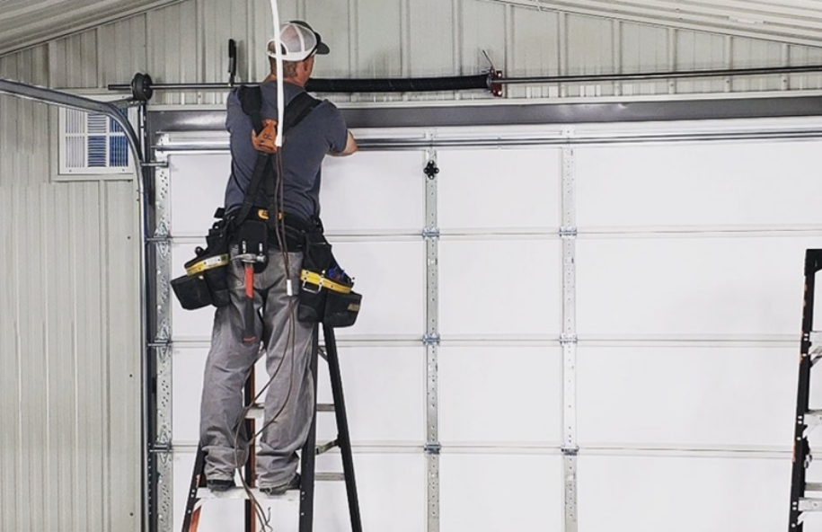 Professional garage door technician at work