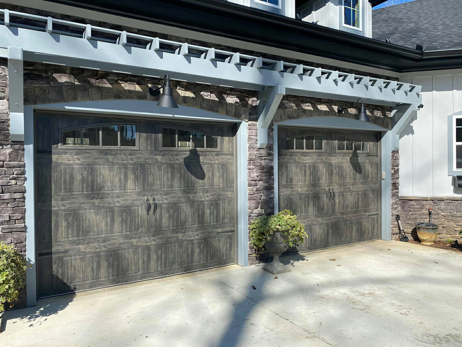Luxury home with double garage doors